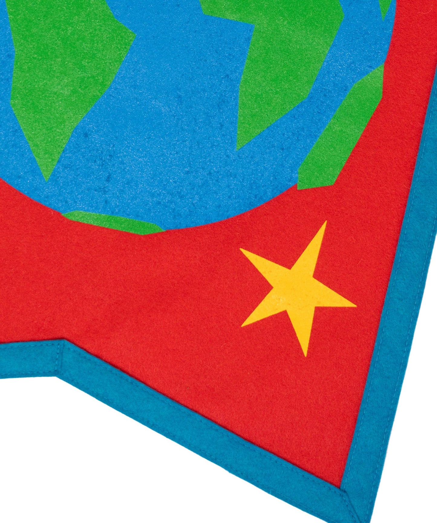 Close-up detail of star in red background of Earth Camp Flag