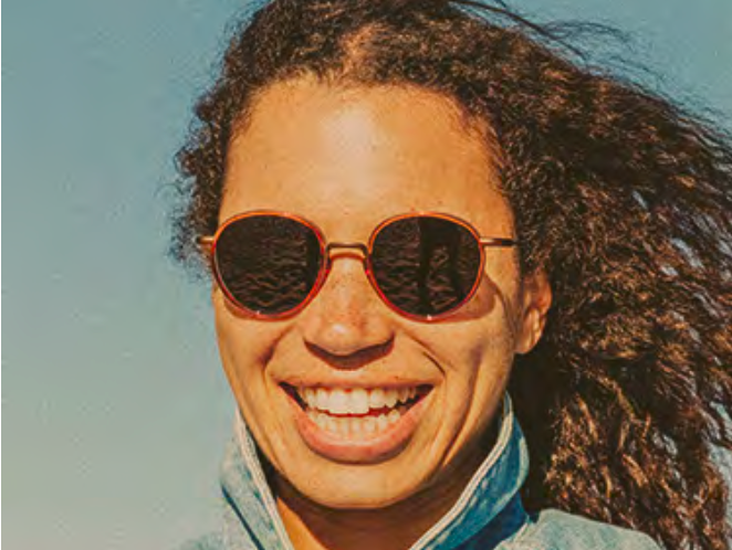 Baia sunglasses by Sunski on female model smiling