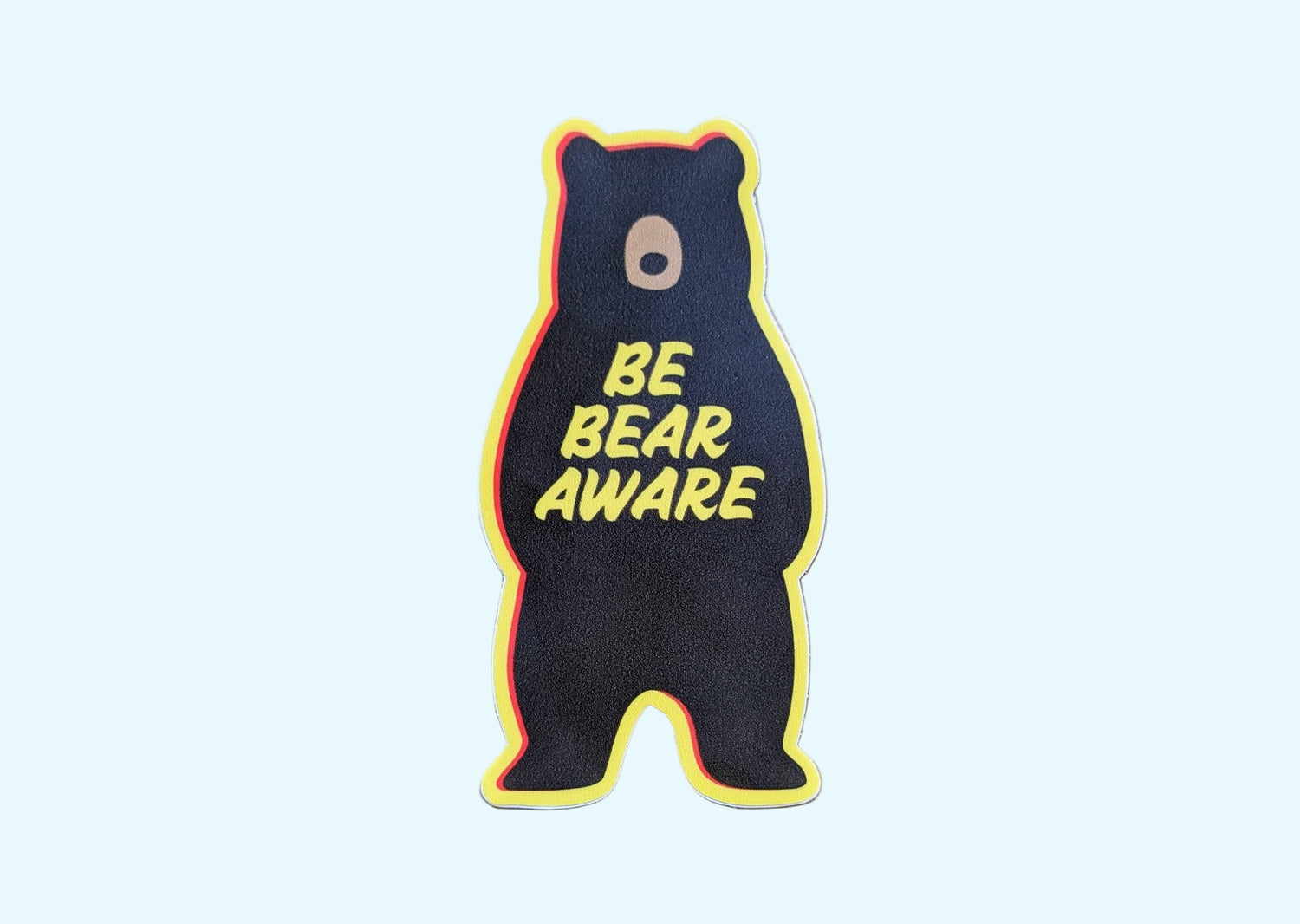 Yellow-bordered bear-shaped sticker that reads: Be Bear Aware