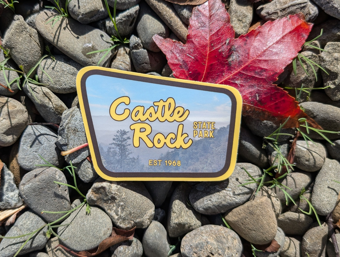 yellow + brown bordered sticker represents Castle Rock State Park