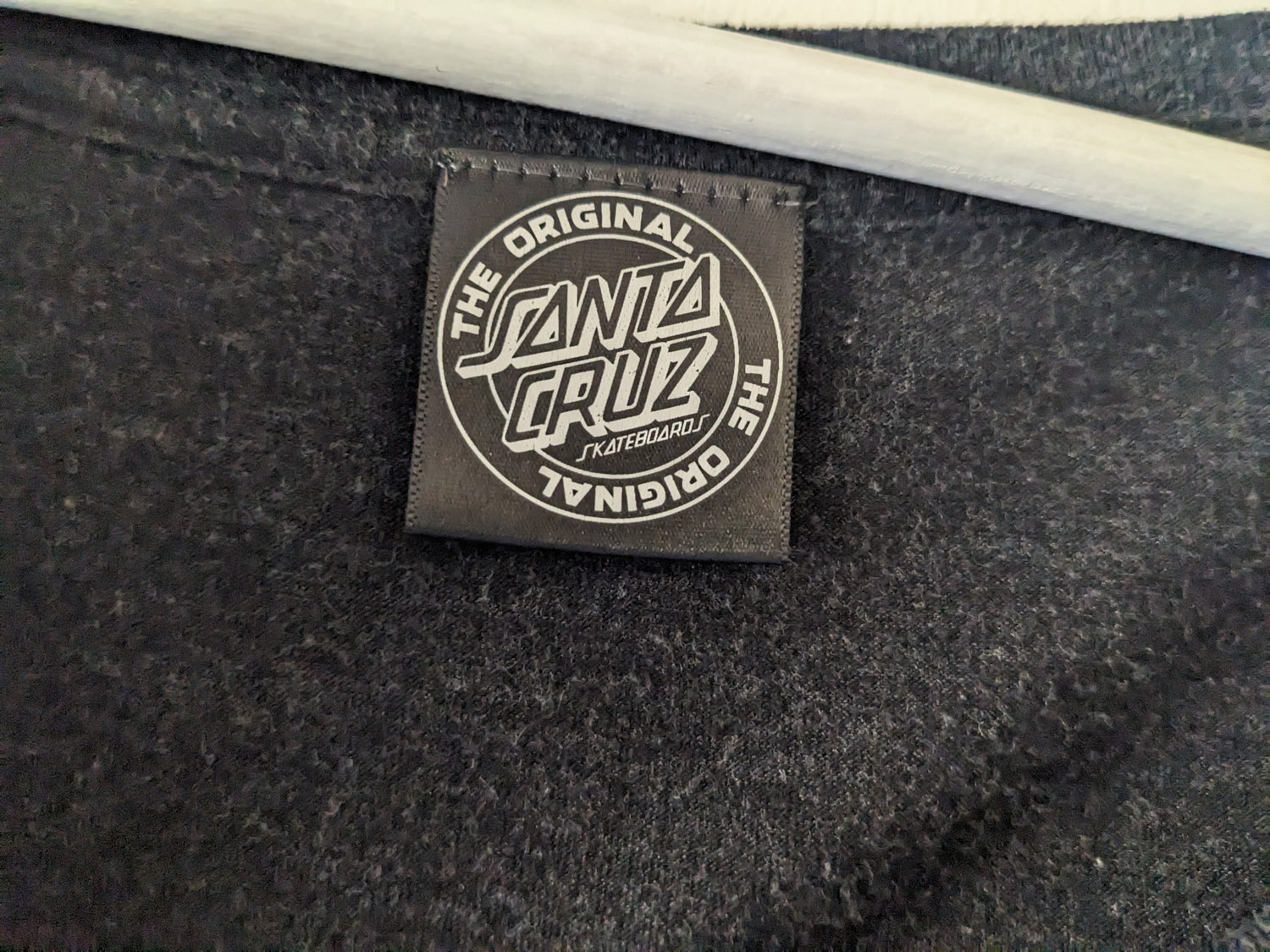 Dark gray Santa Cruz Monarch long sleeve shirt tag