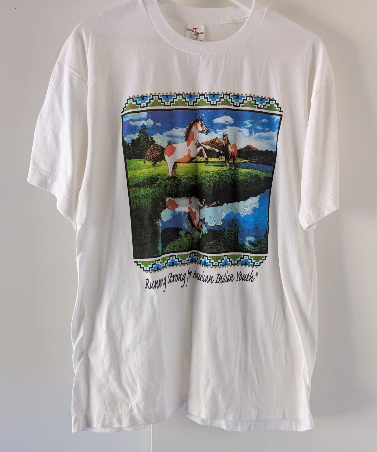 White shirt with Running Horses graphic