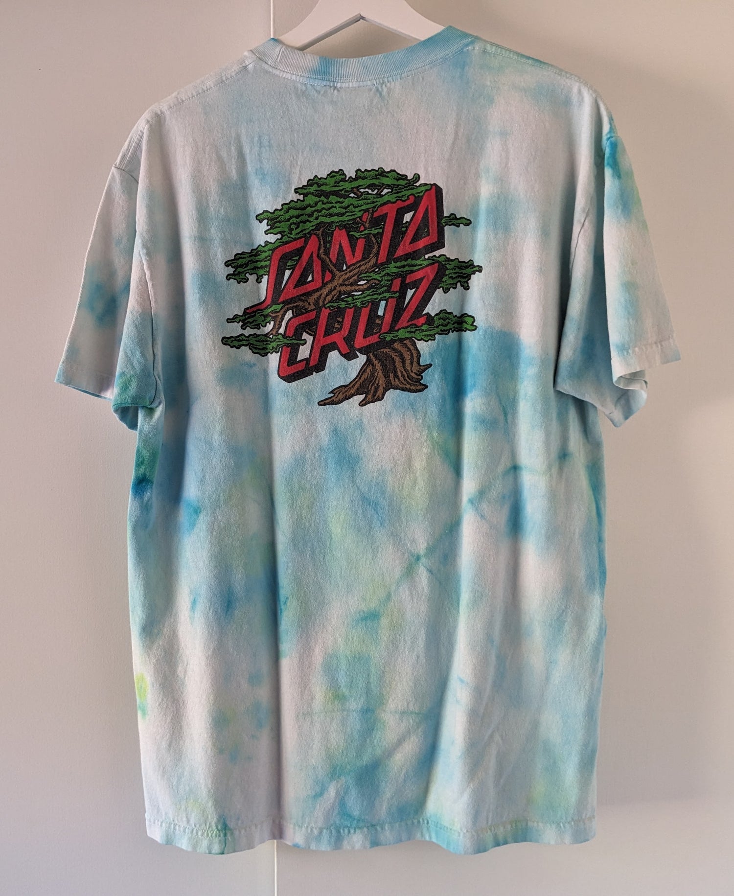 Green and Blue tie dye shirt with Santa Cruz Cypress design back
