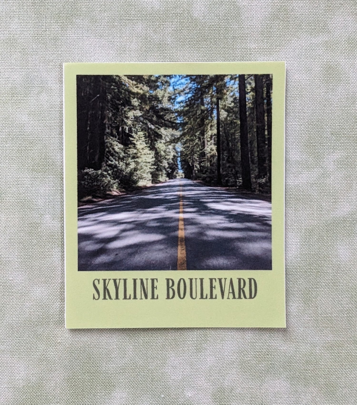 Lime green bordered sticker of photo of Skyline Boulevard