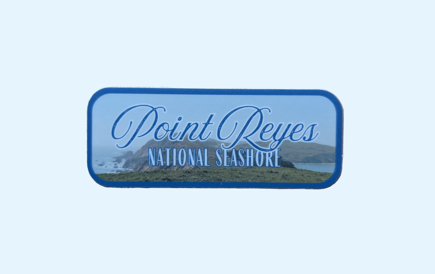 Rectangular sticker with a photo of and words reading: Point Reyes National Seashore