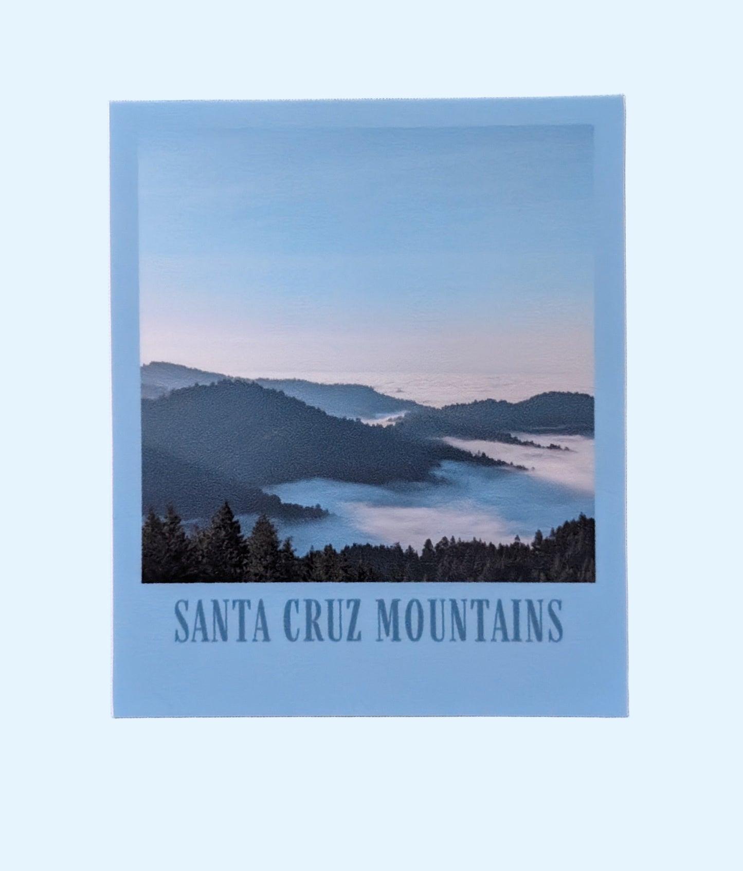 Blue bordered sticker of a photo of the Santa Cruz Mountains