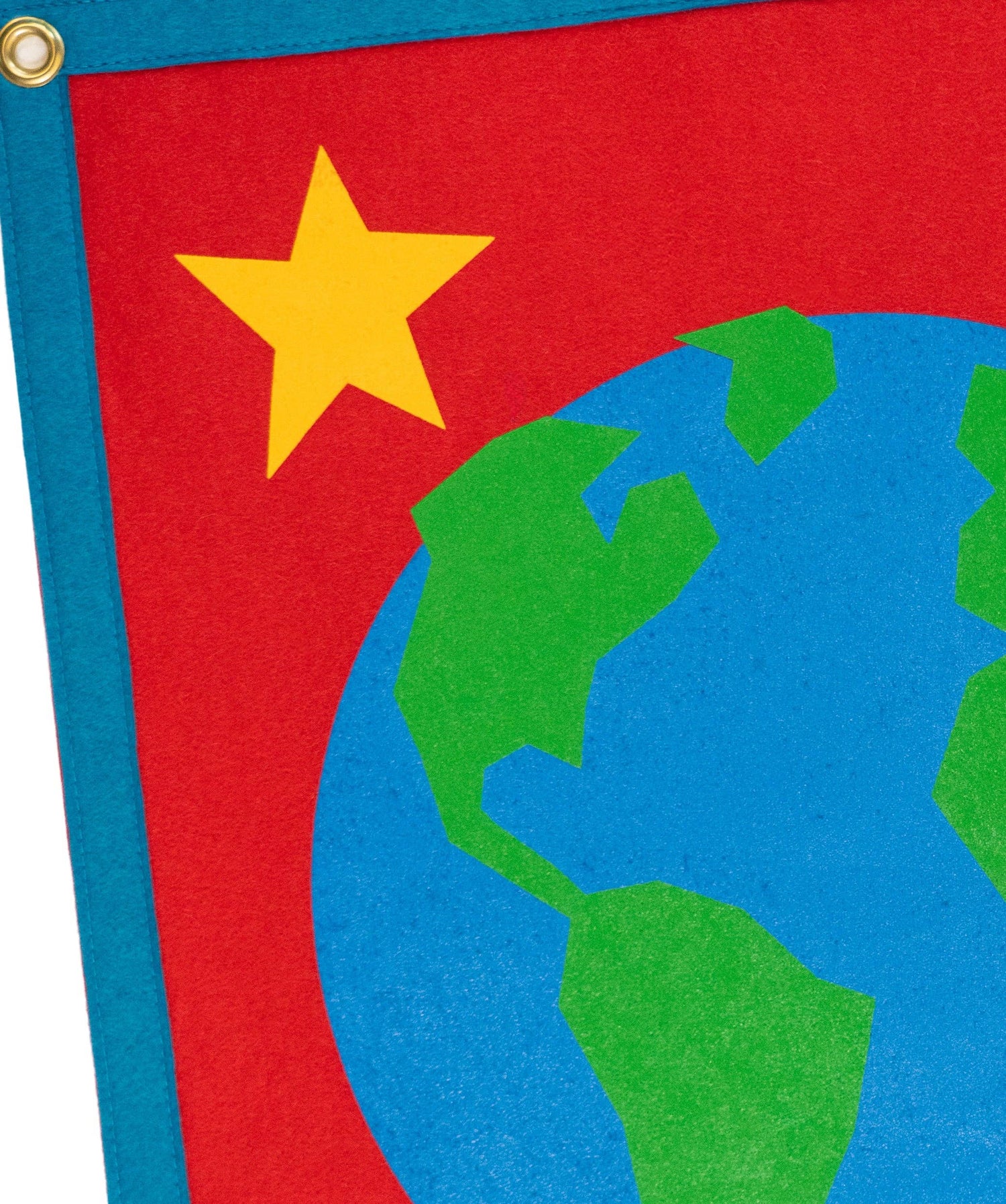 Close-up detail of star in red background of Earth Camp Flag