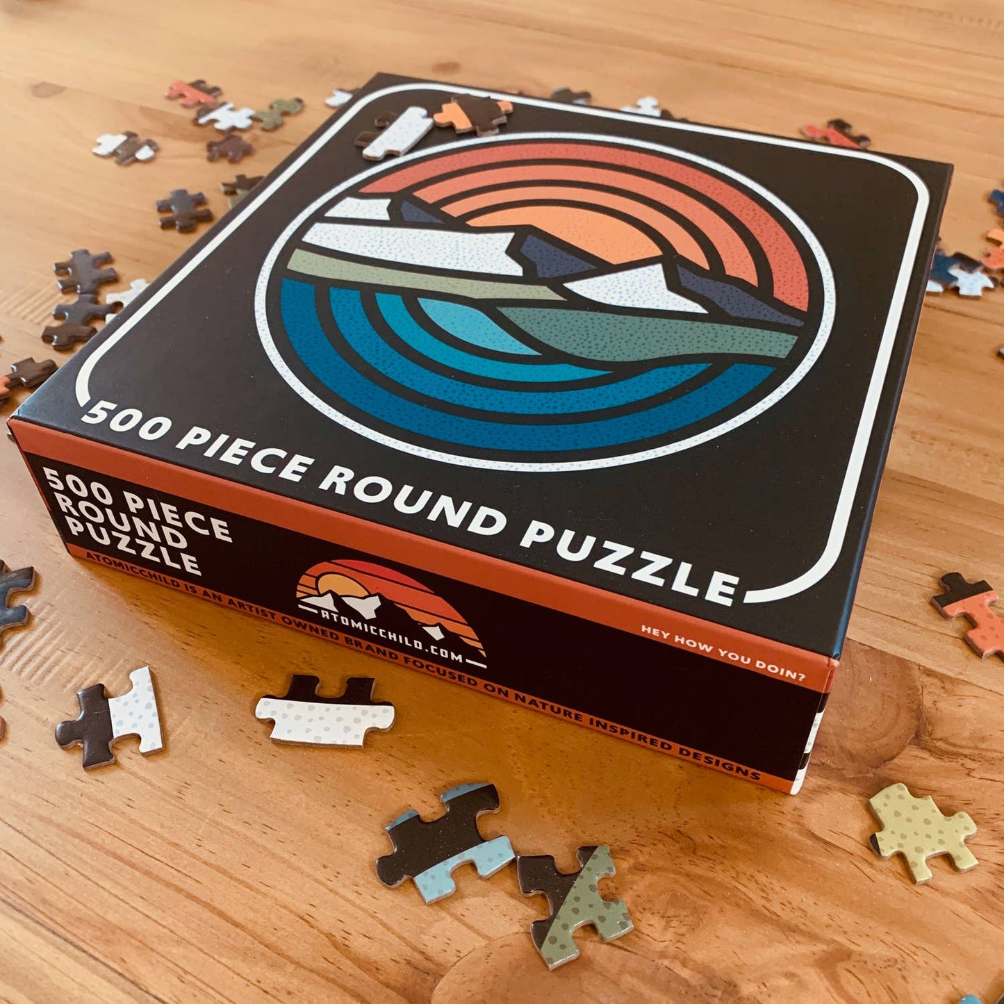 Circle sunset round 500 piece puzzle by Atomic Child
