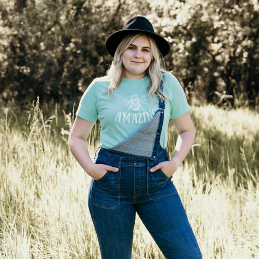 Female model wearing Mint Bee Amazing shirt by Bee Happy Today