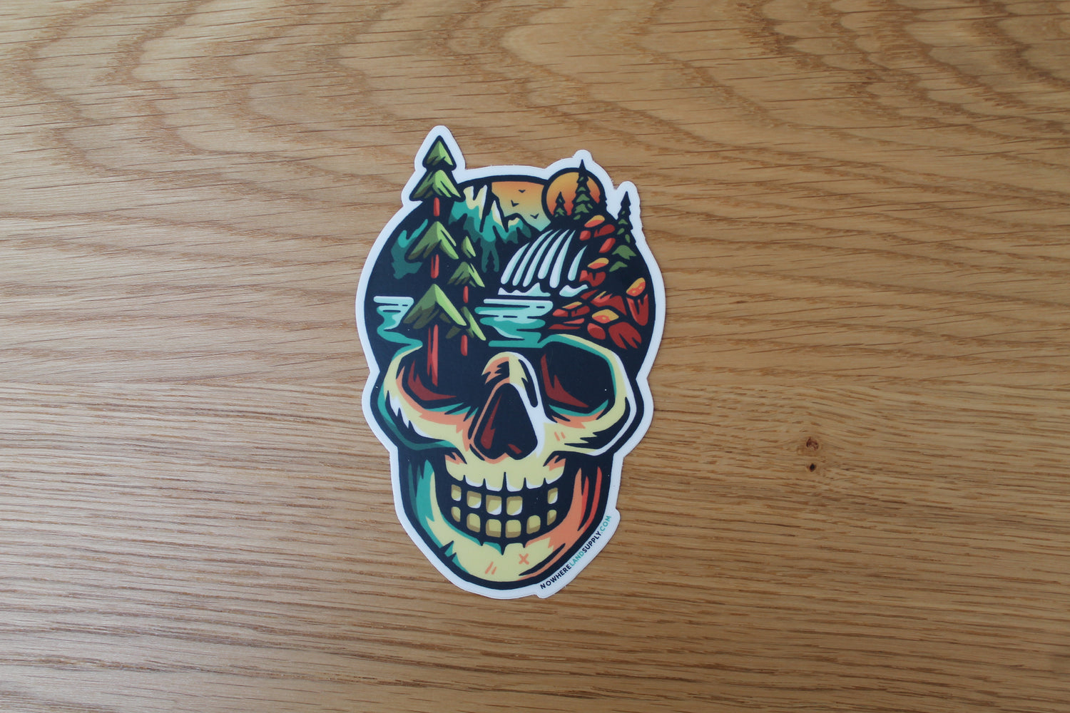 Dust to dust skull nature scene sticker by Nowhereland