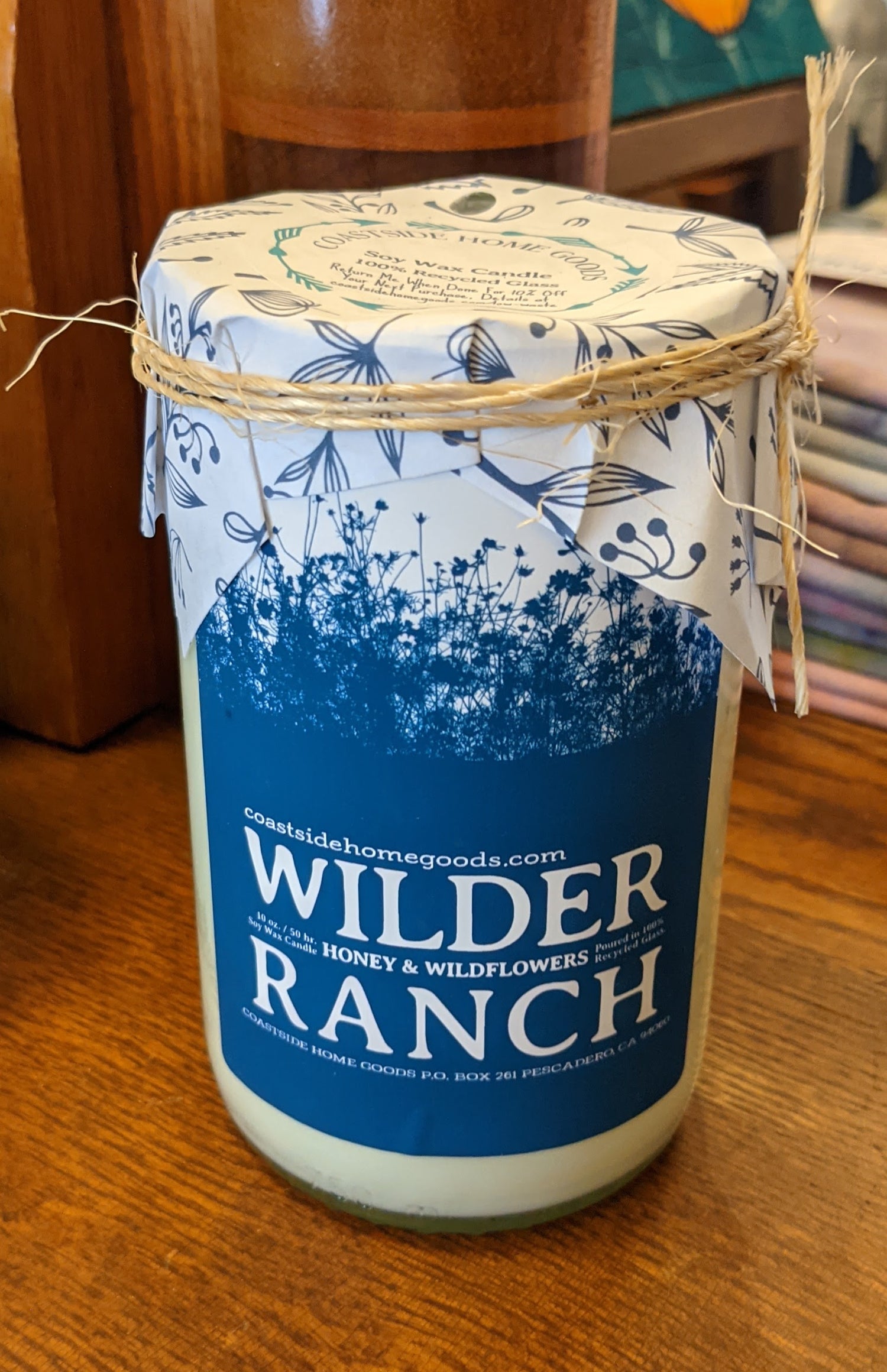 Wilder Ranch candle with Honey and Wildflowers scent in recycled wine bottle by Coastside Homegoods