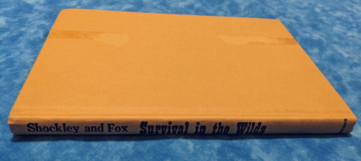 Survival in the Wilds vintage book spine without sleeve