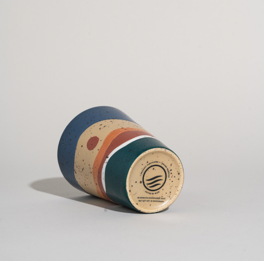 Bottom of stoneware travel mug by United by Blue