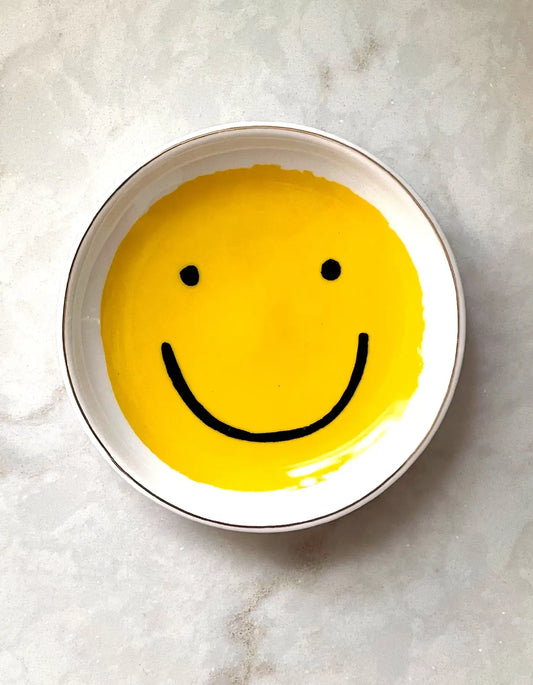 Ceramic smiley face trinket dish by Idlewild