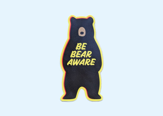 Yellow-bordered bear-shaped sticker that reads: Be Bear Aware