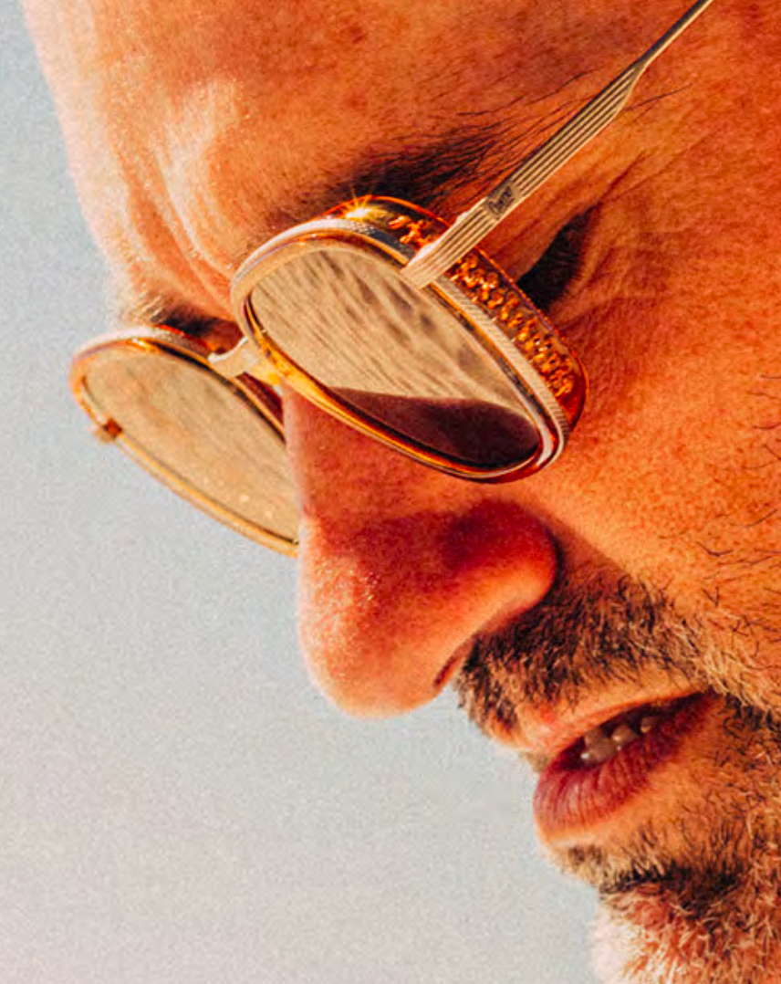 Bernina sunglasses by Sunski on male model close up