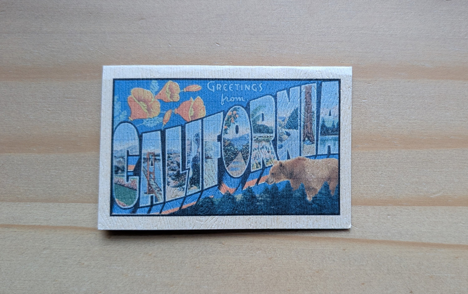 Mini California card with vintage postcard design on wood grain brown paper