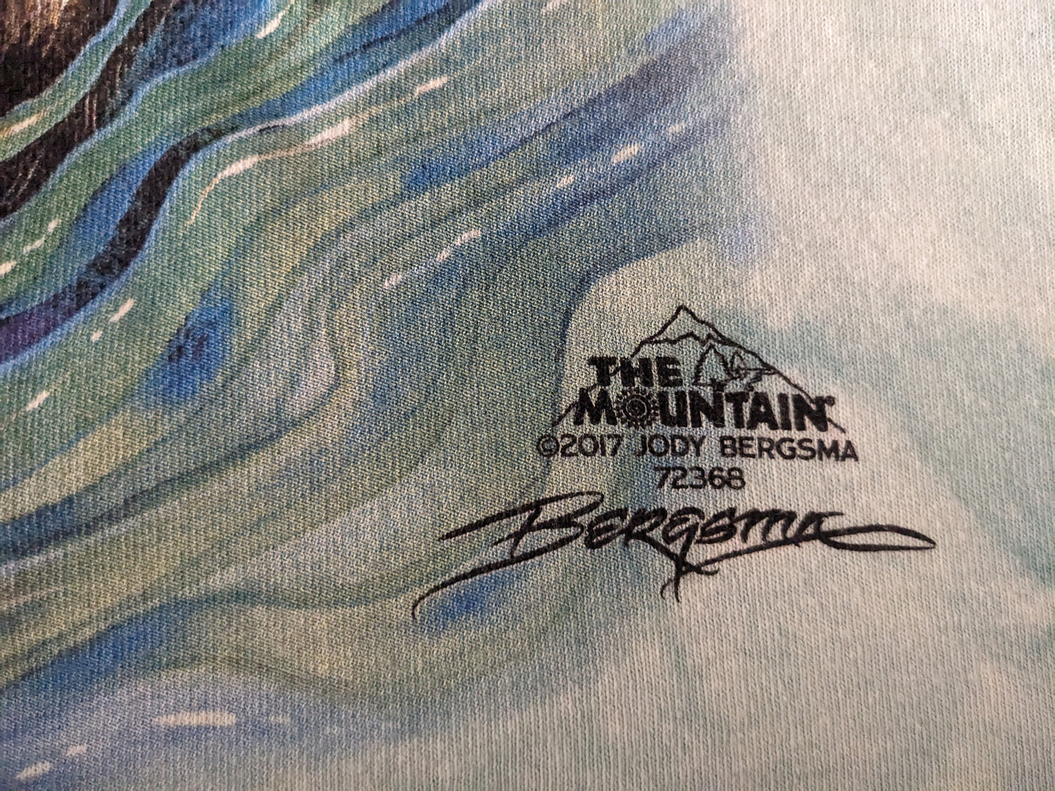 Otters on Mountain kids shirt artist signature