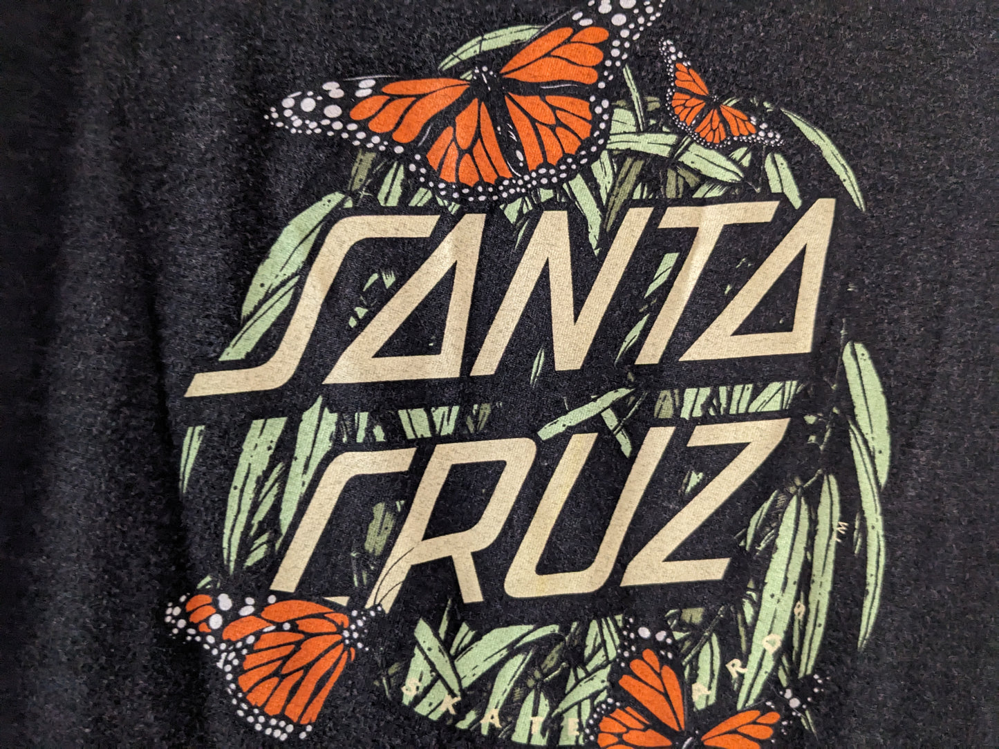 Dark gray Santa Cruz Monarch long sleeve shirt graphic close up