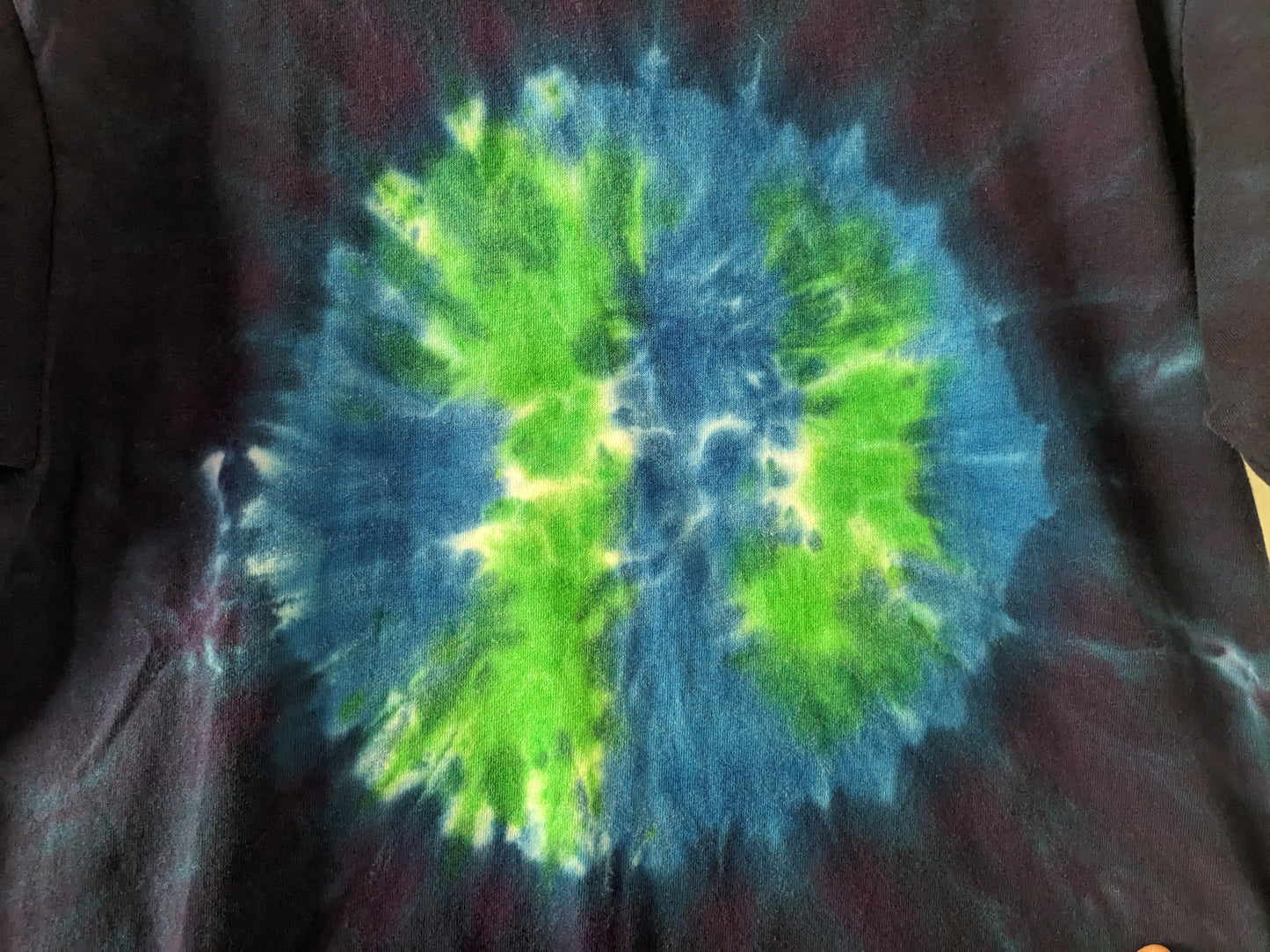 One of a kind Earth Tie Dye shirt close up