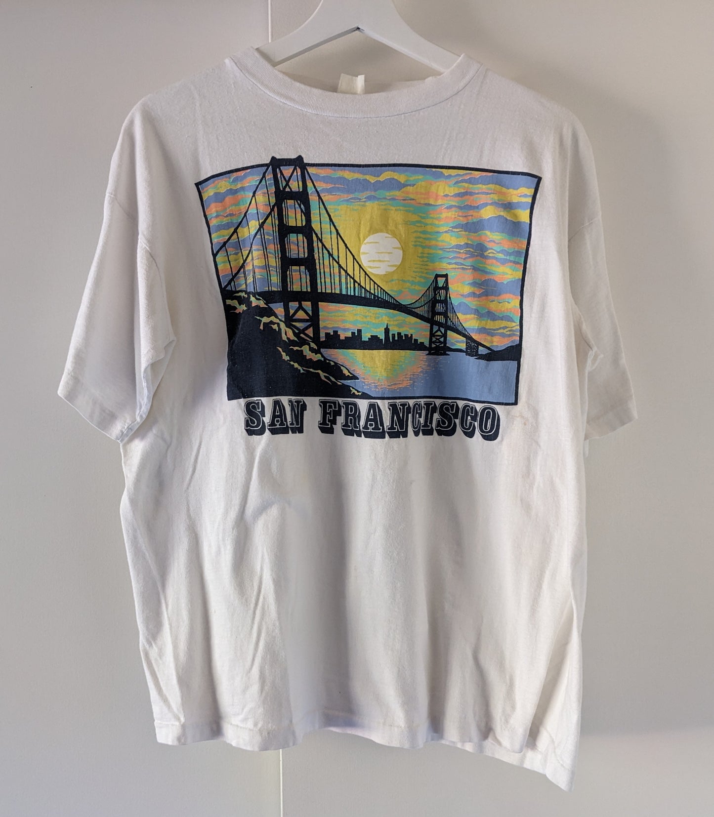 White shirt with San Francisco pastel sunset graphic