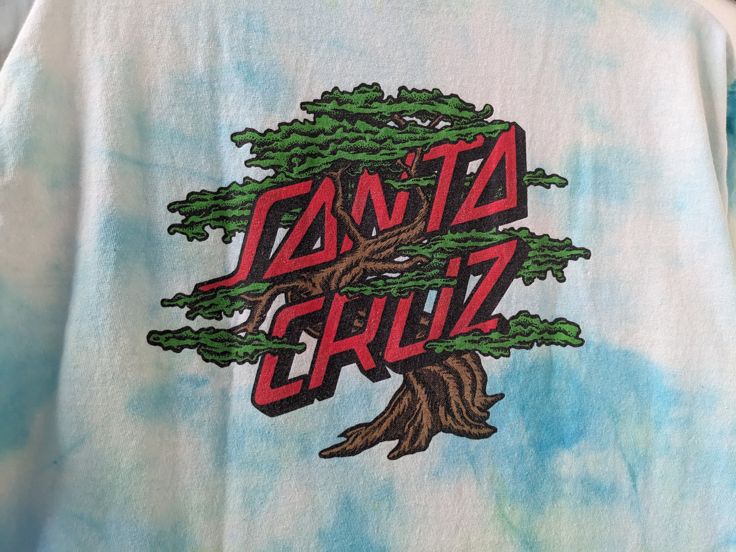 Green and Blue tie dye shirt with Santa Cruz Cypress design graphic close up
