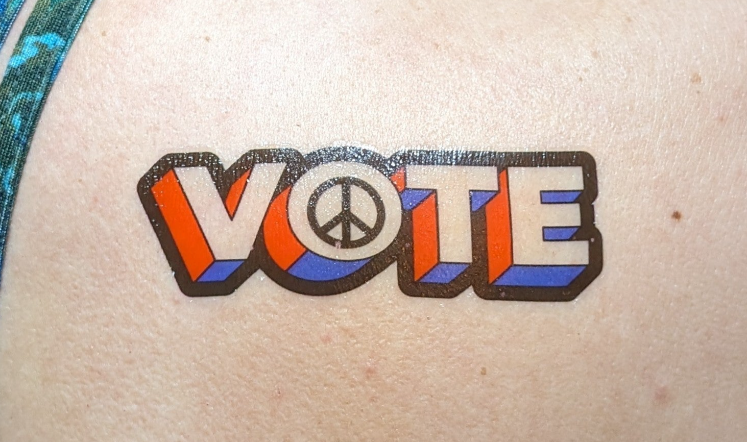 Close Up of Vote Peace temporary tattoo
