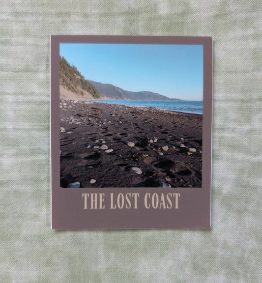 The Lost Coast sticker with photo of a beach on the Lost Coast and brown border