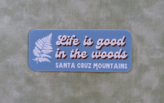 Life is good in the woods Santa Cruz Mountains rectangular sticker with white fern and blue background