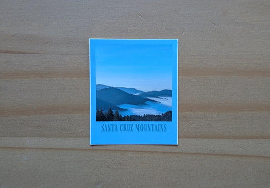 Blue bordered sticker of a photo of the Santa Cruz Mountains