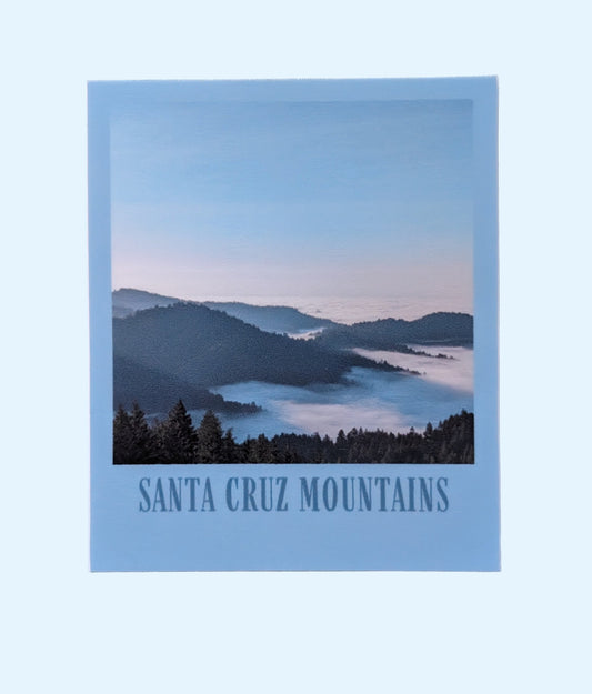 Blue bordered sticker of a photo of the Santa Cruz Mountains