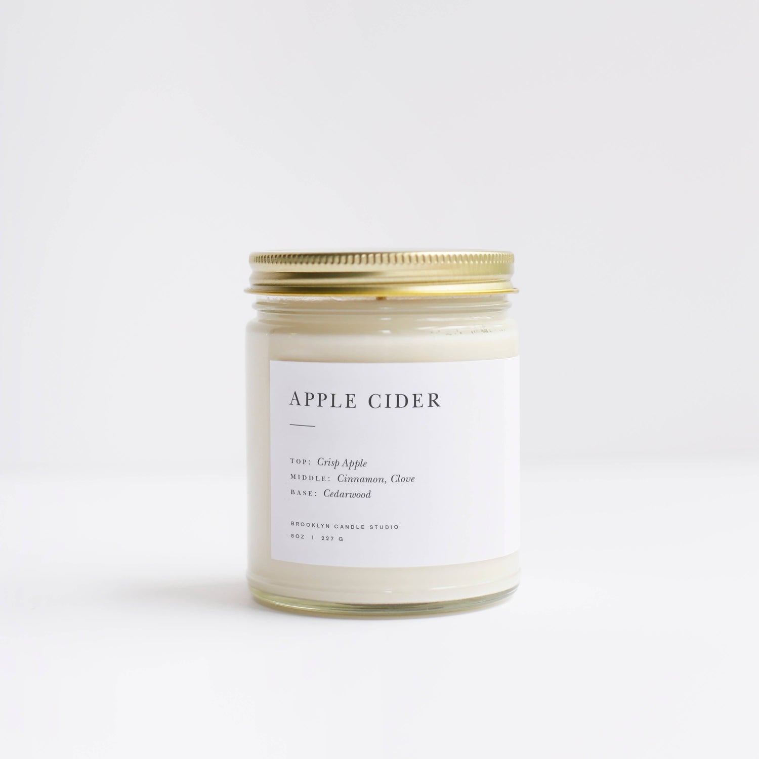 Apple Cider Minimalist candle in glass jar with metal lid by Brooklyn Candle Studio
