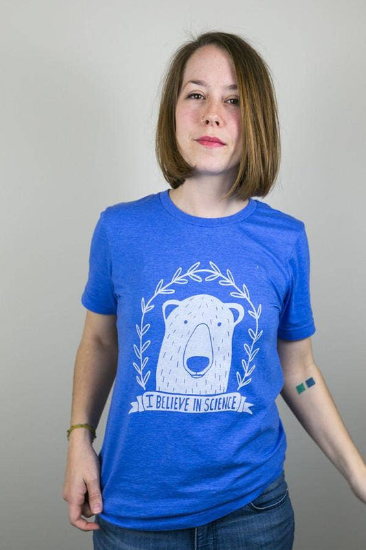 Blue shirt with polar bear that reads "I Believe in Science" by Culture Flock