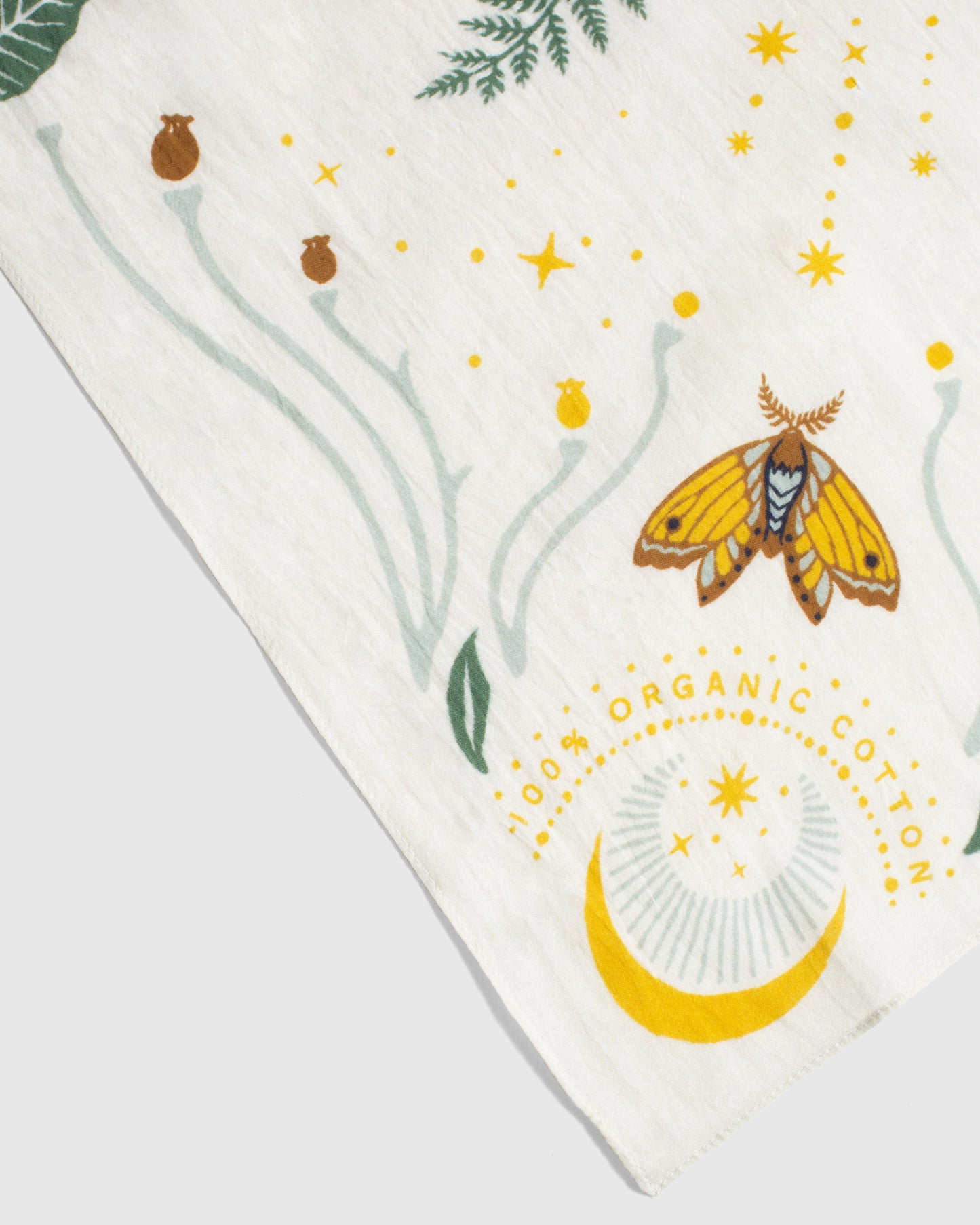 Close up of moth and moon bandana by United by Blue