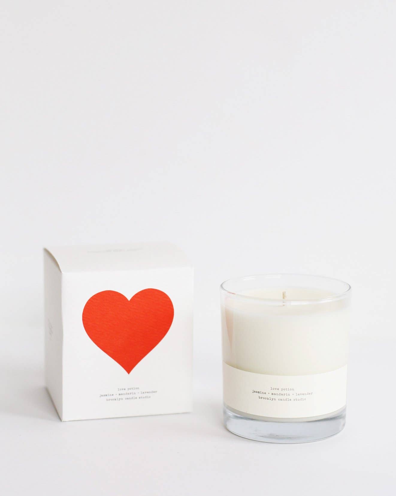 Love Potion Minimalist candle in elegant glass holder with heart box by Brooklyn Candle Studio