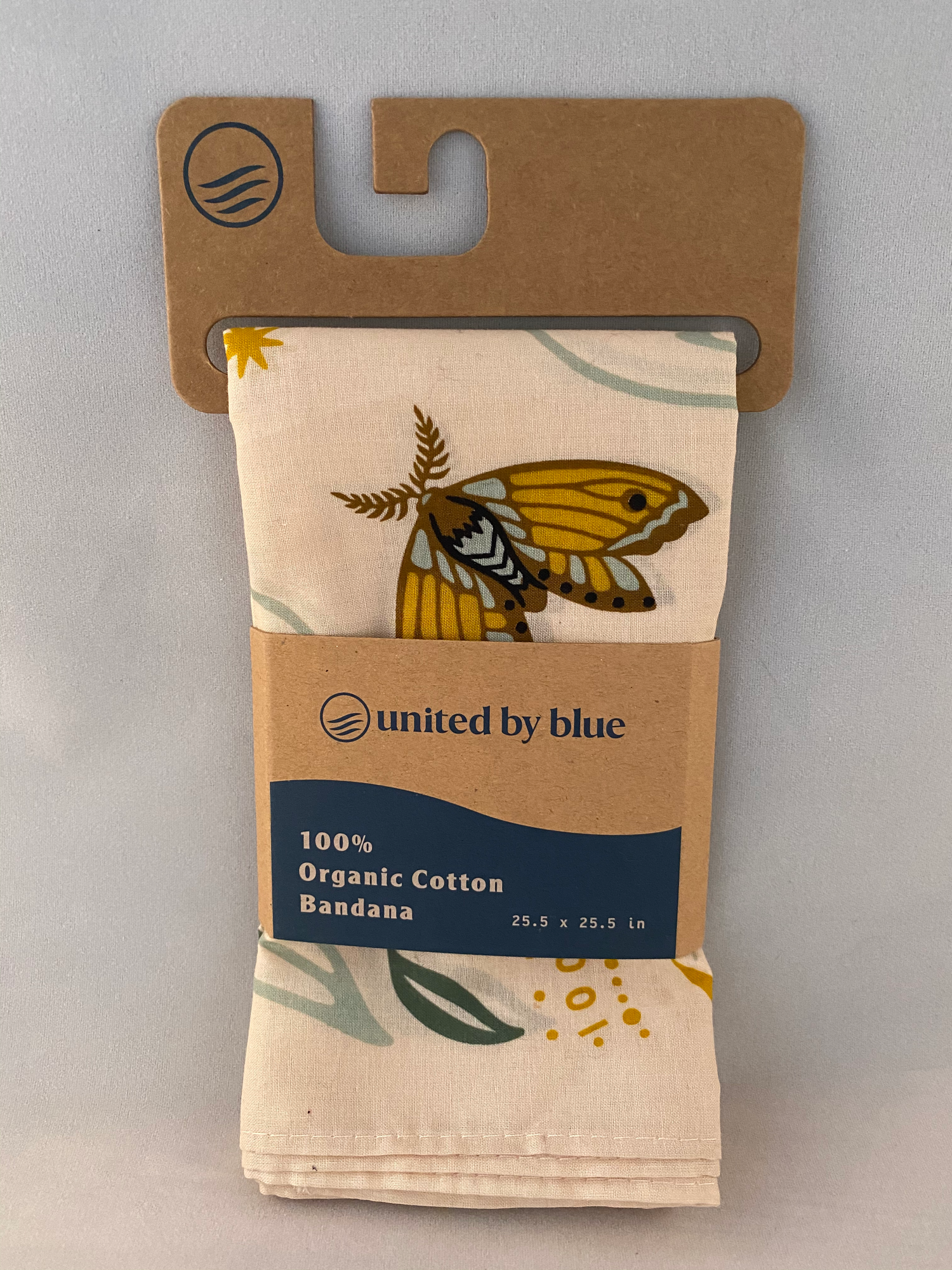 Moth and Moon bandana in packaging by United by Blue