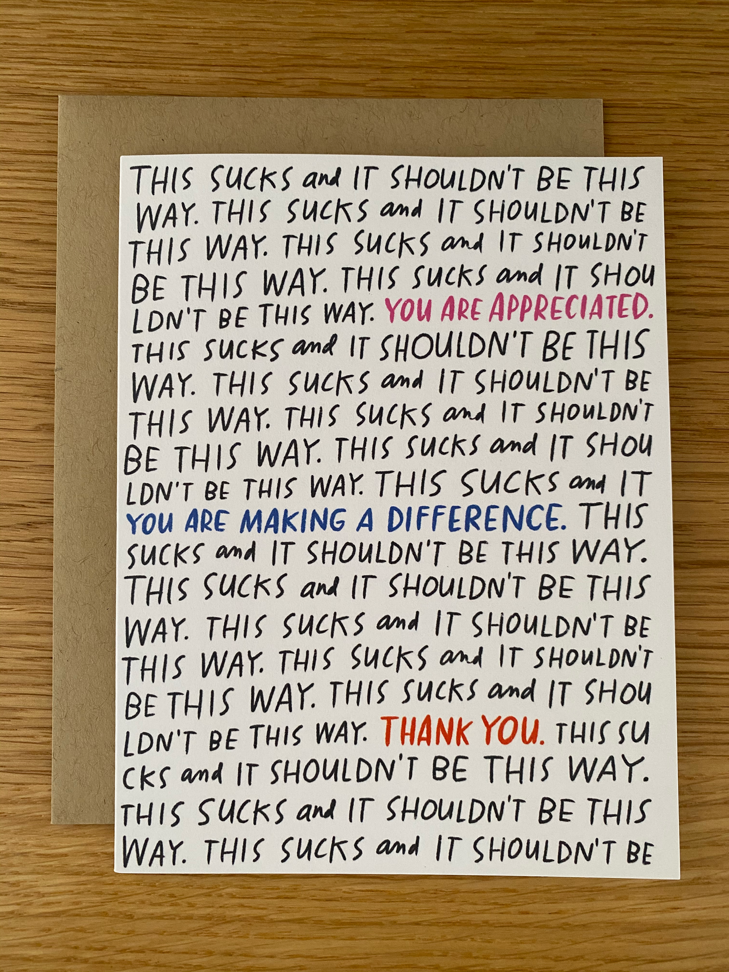 Word jumble card that reads "Thank You, This sucks, You are appreciated, You are making a difference" white card by Emily McDowell