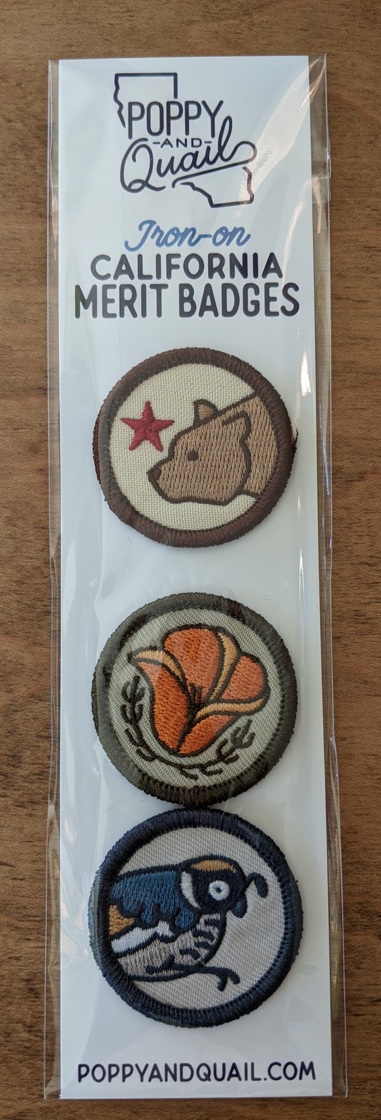 Iron-on Patches Merit Badges series including small round patch of bear, poppy and quail by Poppy & Quail
