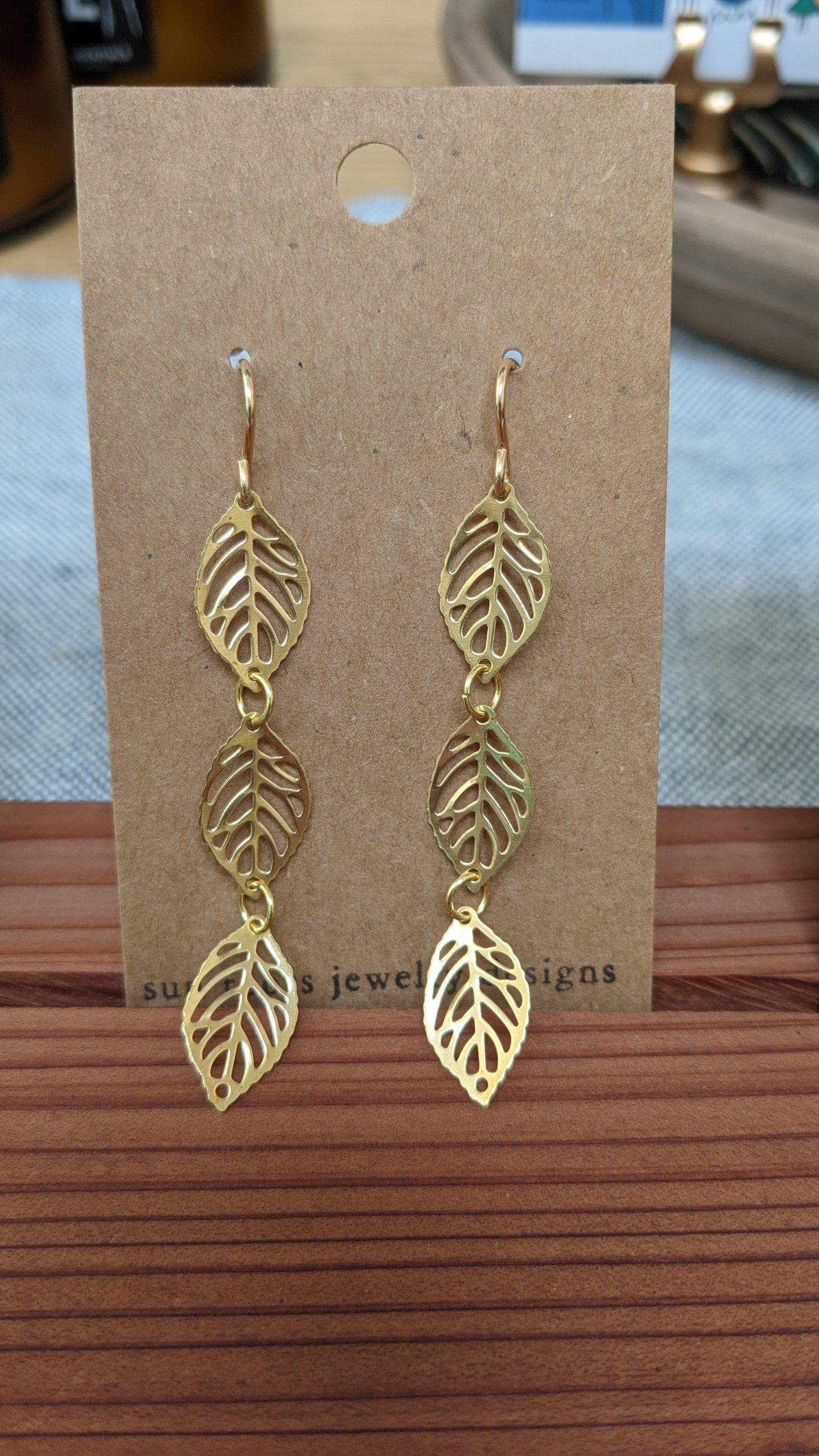 Triple leaf drop brass earrings by Sunroots Jewlery