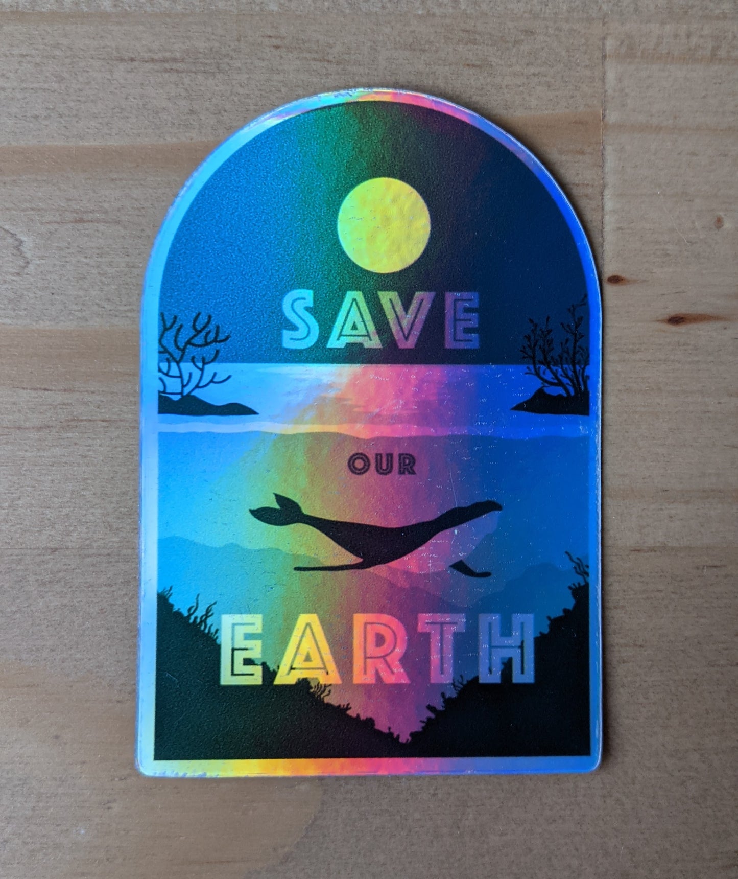 Arched sticker with ocean whale scene reading "Save our earth"  created by Jackie from Present