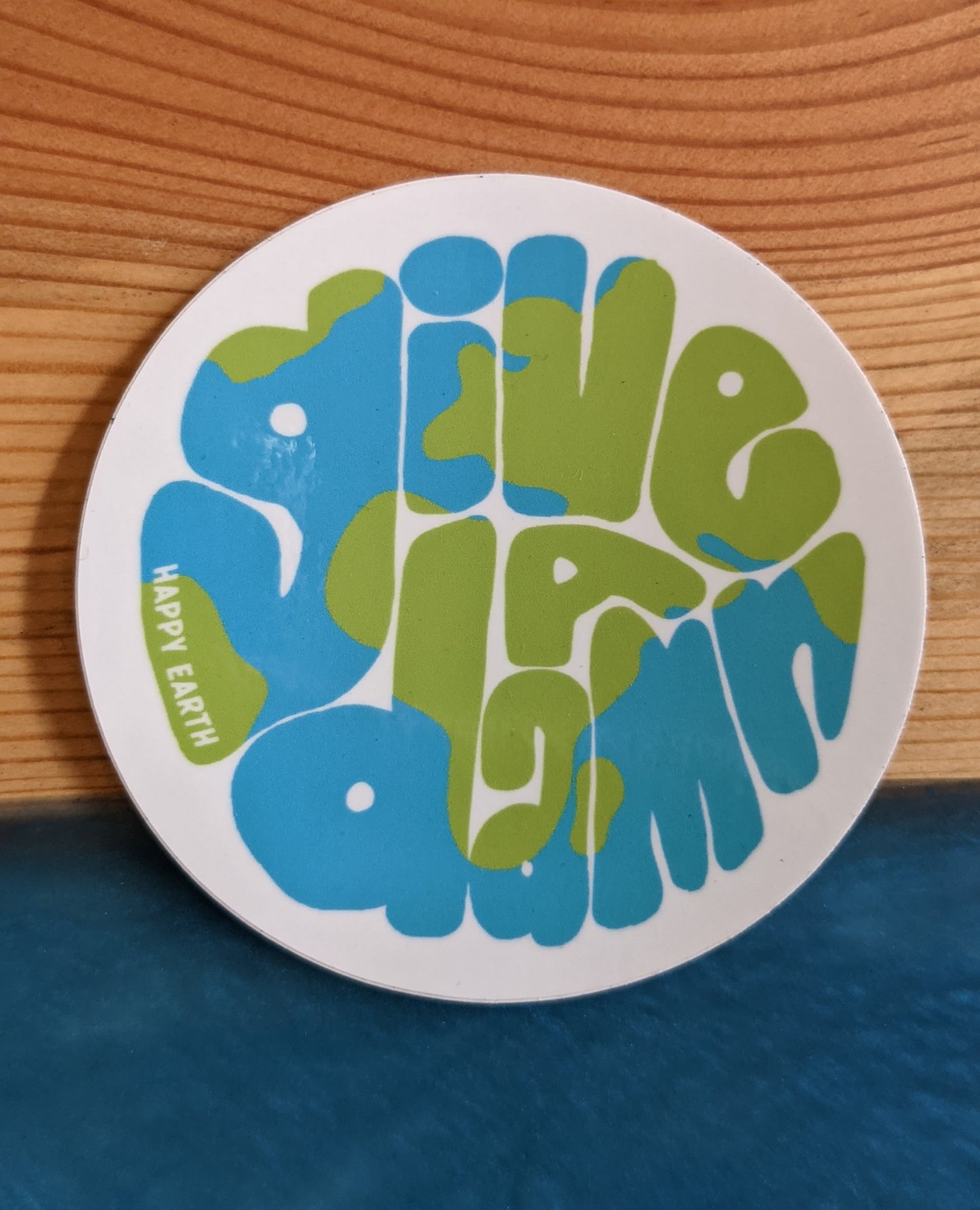 Round Give a Damn earth sticker by Happy Earth