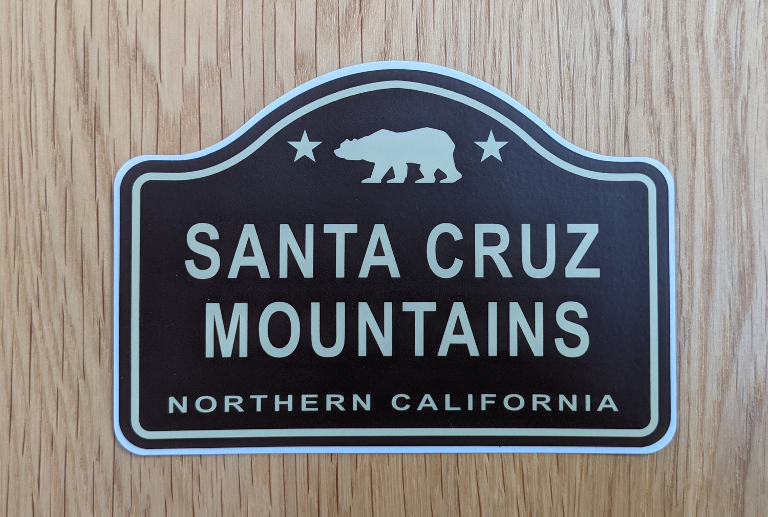 Historic sign inspired brown sticker reading "Santa Cruz Mountains, Northern California", by SCM Clothing