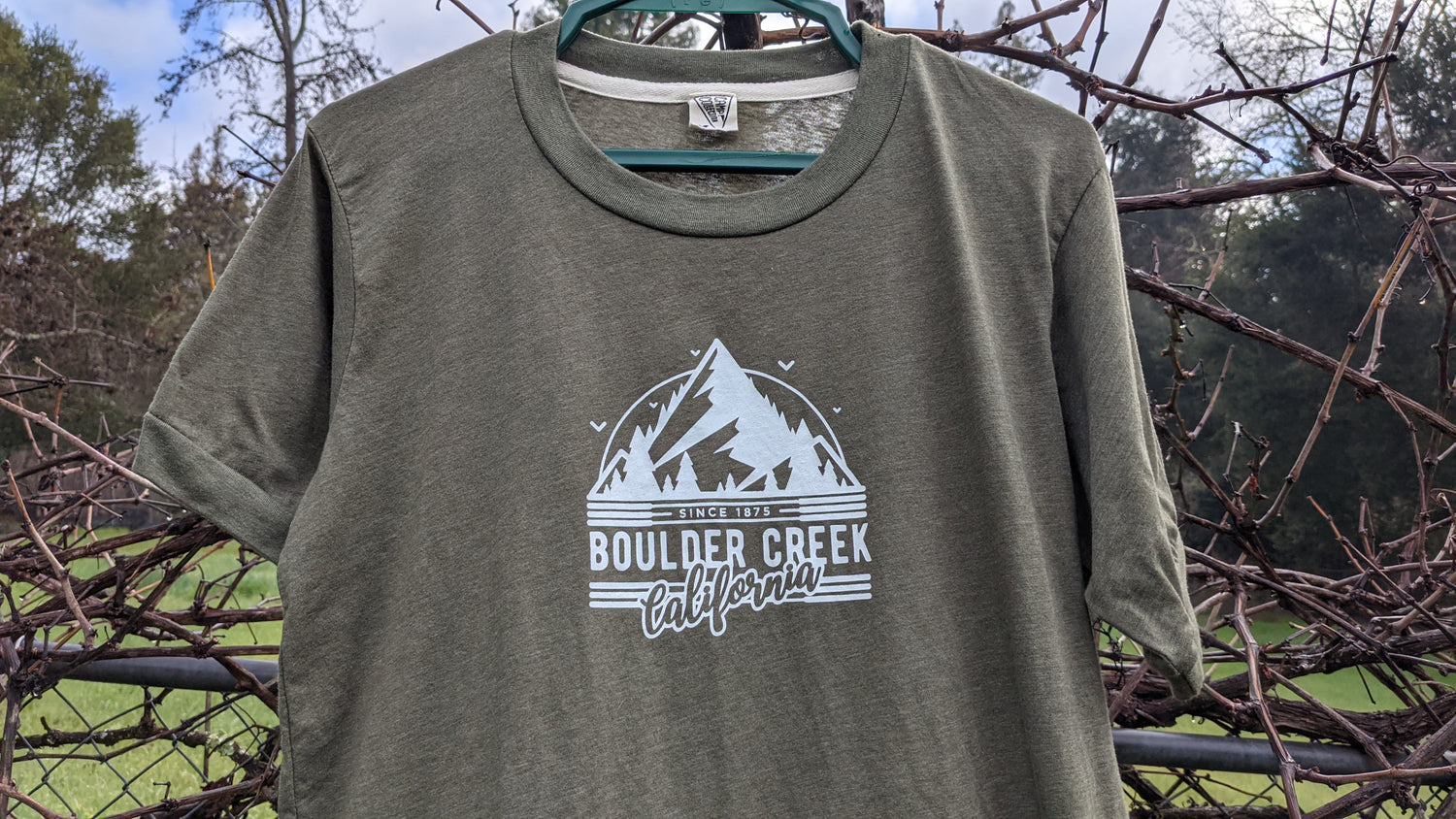 Olive Ringer tee by Camp Collection with Boulder Creek California design on front in white