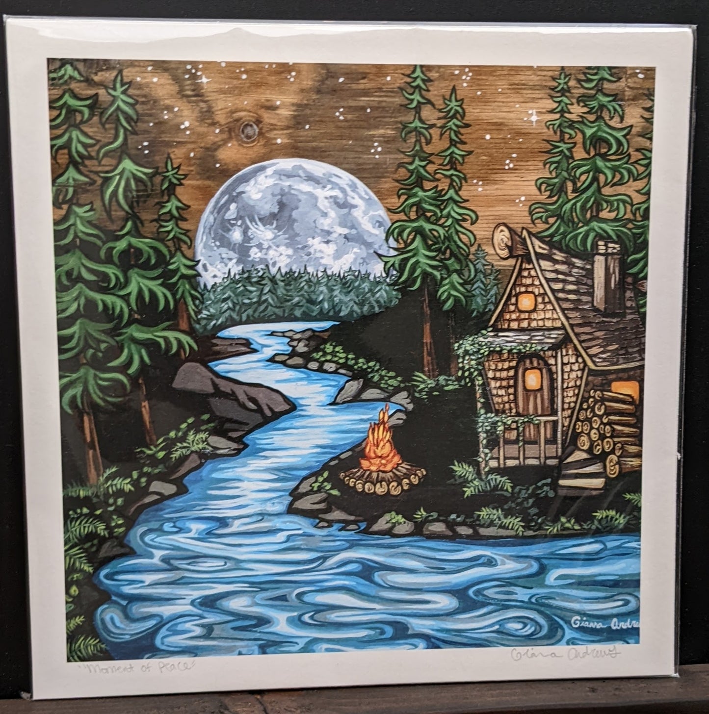Moment of Peace Cabin by the River with full moon art print by Gianna Andrews