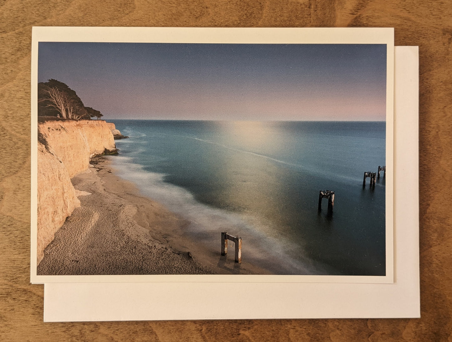 Local photography card by Sean McLean with white envelope, design of coastal bluffs in Davenport