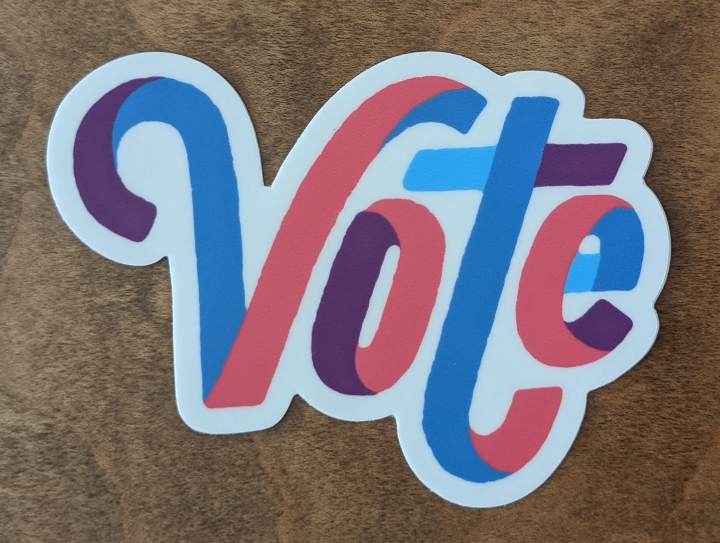 Vote sticker in red, blue and purple