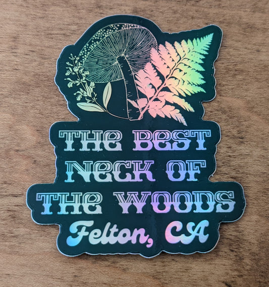 Mountain Talk holographic sticker reading The Best Neck of the Woods, Felton, CA with mushroom and fern design
