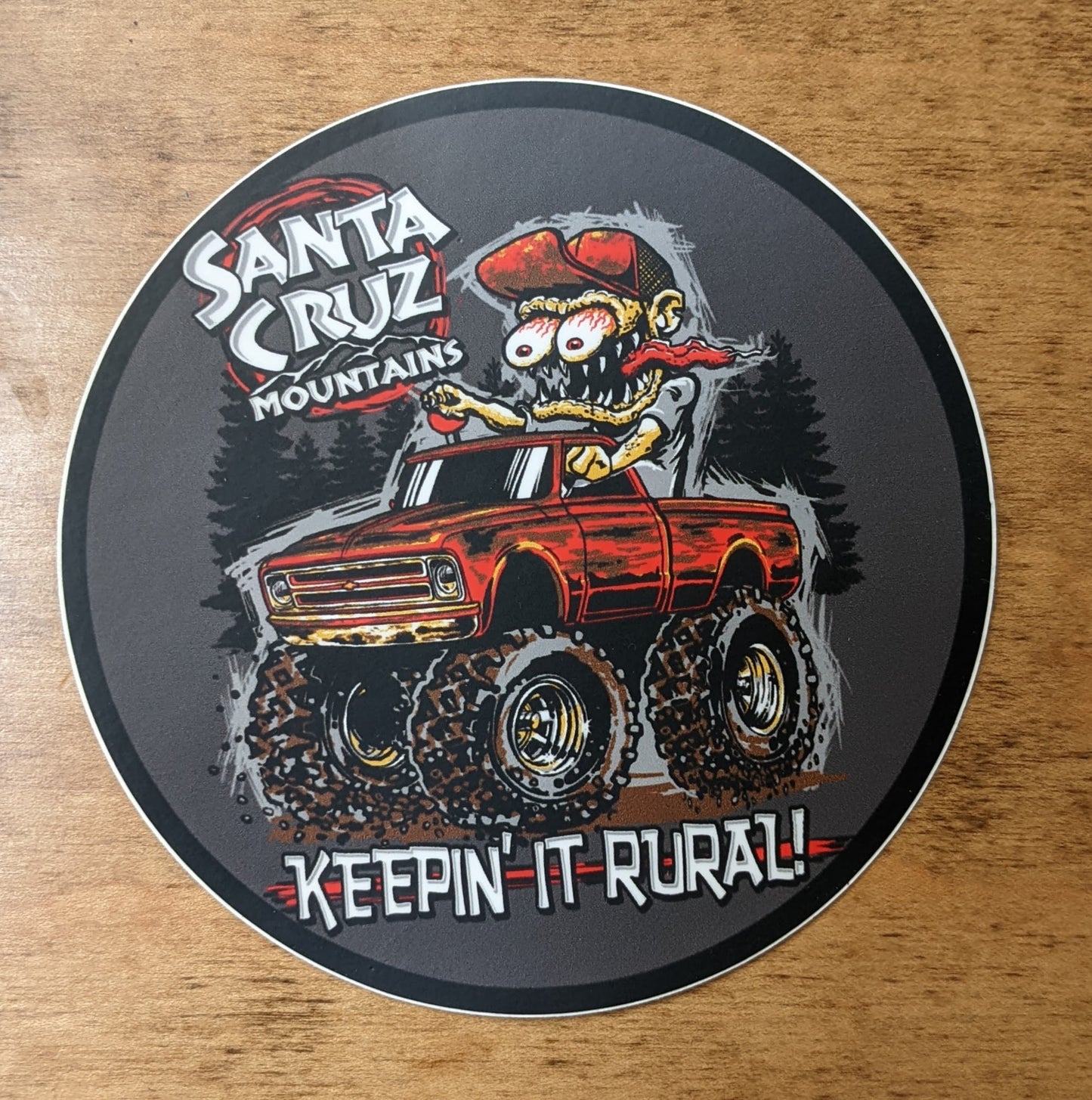 Round Santa Cruz Mountains, Keepin' It Rural! monster truck sticker, by SCM Clothing