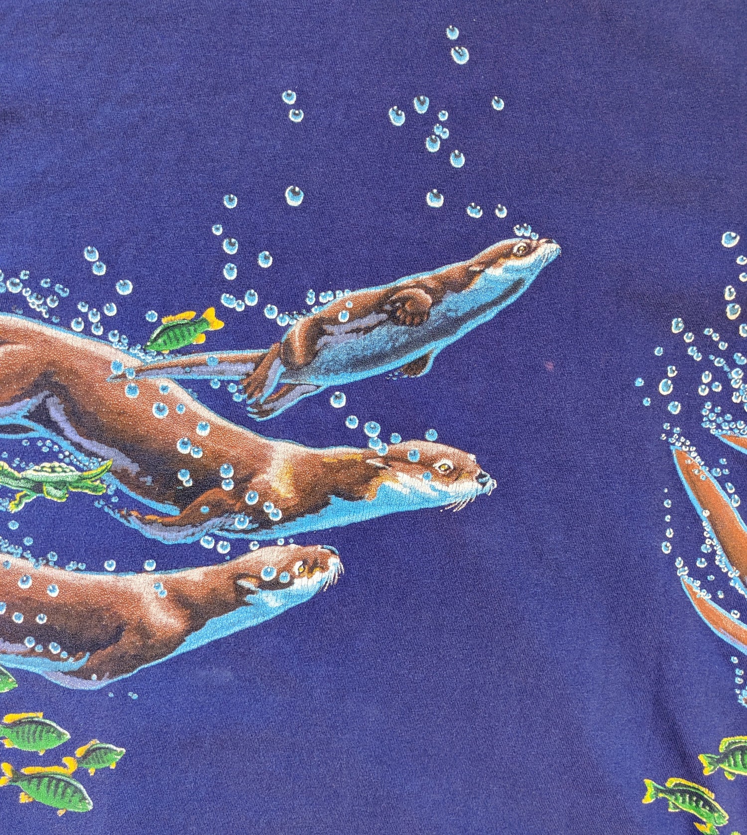 Purple Double Sided Underwater Otters Shirt close-up
