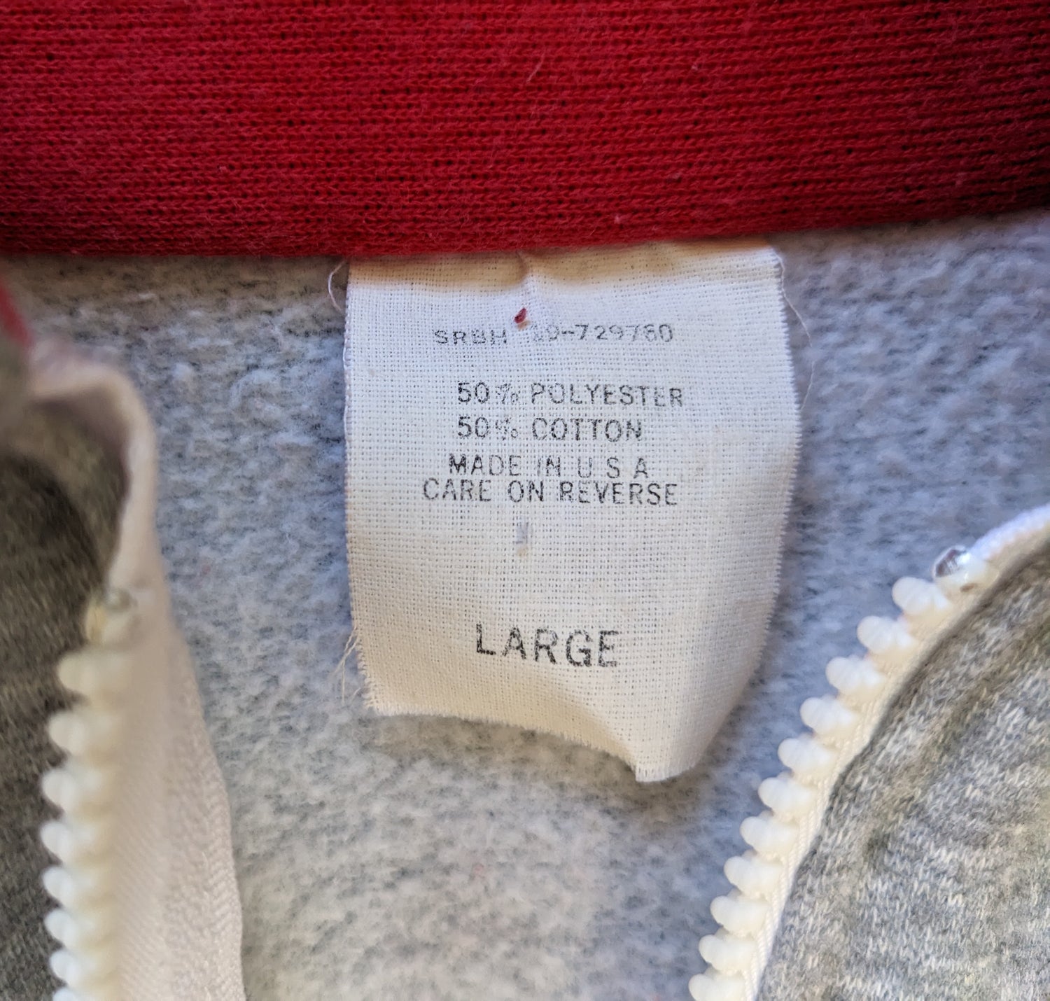 Red and gray Carmel USA pullover tag details